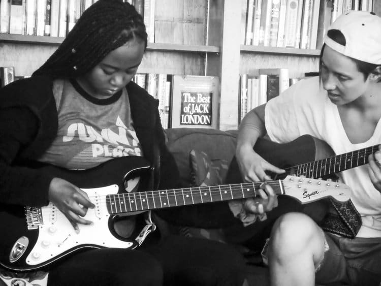 girls playing guitar