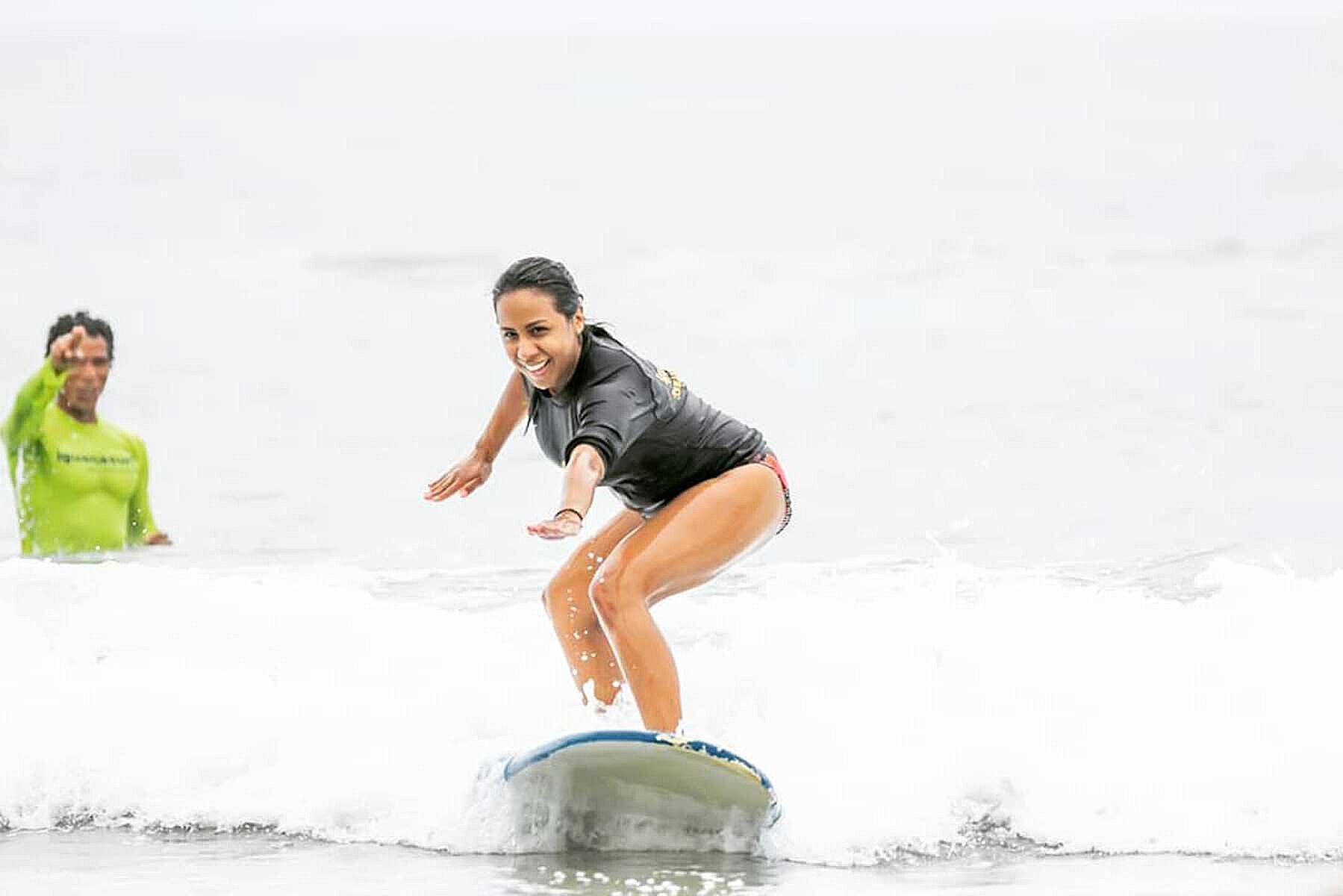 girl surfboarding
